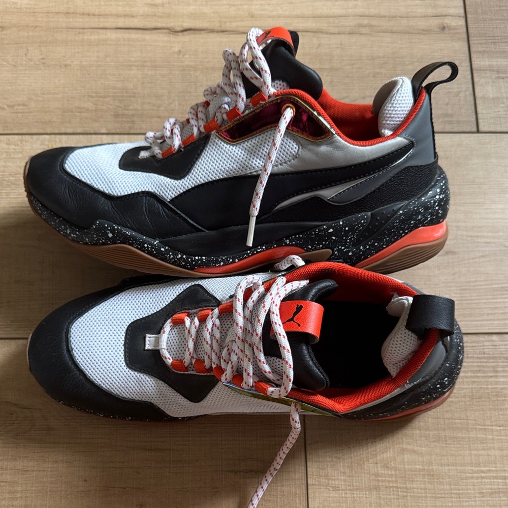 Puma Black, White, and Orange Sneakers